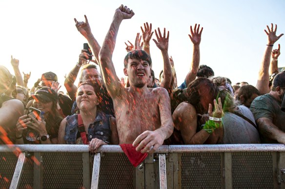 Festival goers get splattered with fake blood at a typical Gwar performance in Louisville, Kentucky.