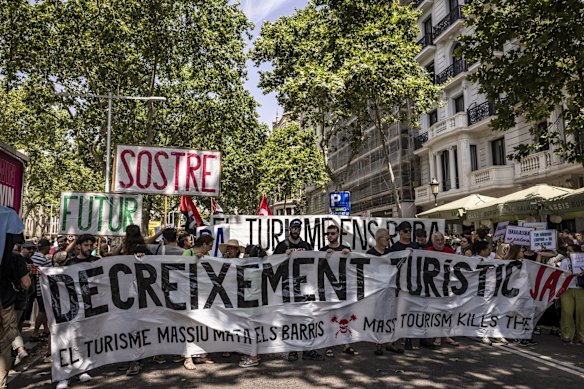 Demonstrators in Barcelona protest  against tourism in June.