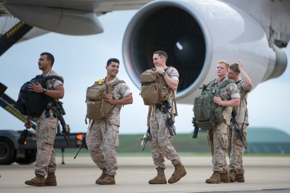 US Marines embark an aircraft at RAAF Base Darwin for their return home.