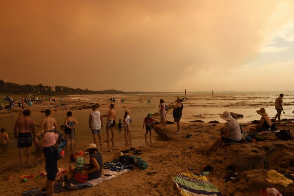 Holidaymakers on the beach at Currarong on December 31.