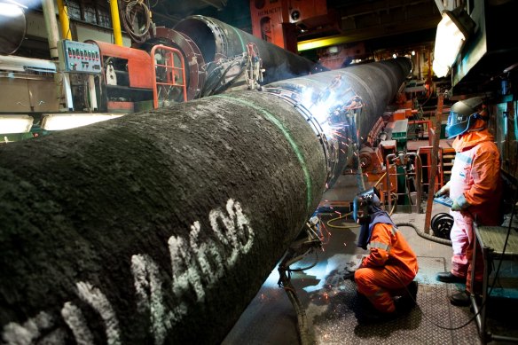 Workers weld a section of pipeline aboard the Castoro Sei, another Saipem pipe laying vessel, in the Baltic Sea. Uncontrolled movement of the pipeline can endanger workers.