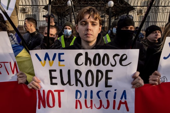 Protesters outside the Russian embassy in Kyiv on Tuesday.