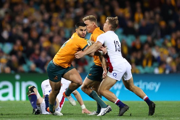 Tom Wright is tackled during game three at the Sydney Cricket Ground.
