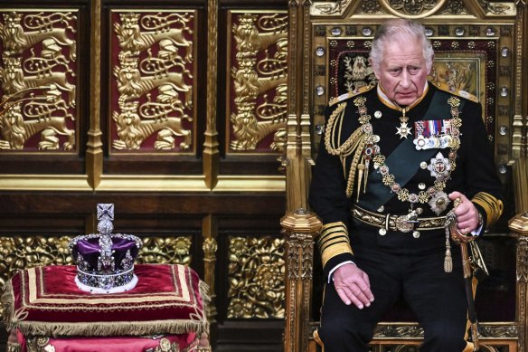 Britain’s Prince Charles sits by the The Imperial State Crown in the House of Lords Chamber, during the State Opening of Parliament, in May 10, 2022. 