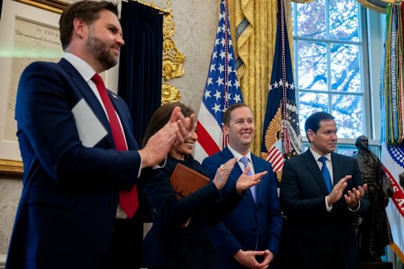 US Vice President JD Vance (left) and Secretary of State Marco Rubio (far right) lead applause at the swearing-in of Sergio Gor (second from right) as US ambassador to India in the Oval Office in November.