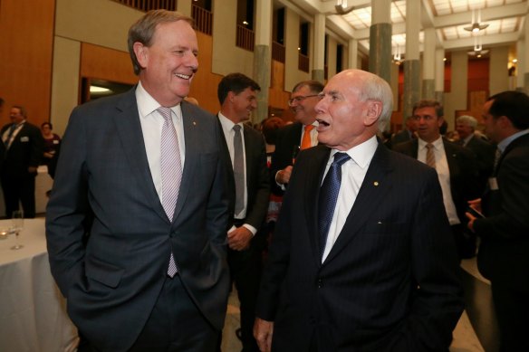 Former Treasurer Peter Costello and former Prime Minister John Howard during a function to celebrate the 20th anniversary of his 1996 election victory, at Parliament House in Canberra in 2016. 