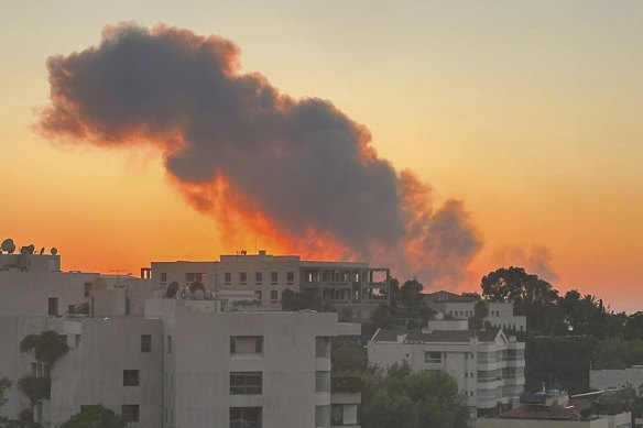 Smoke rises from Israeli airstrikes in Beirut on Friday.