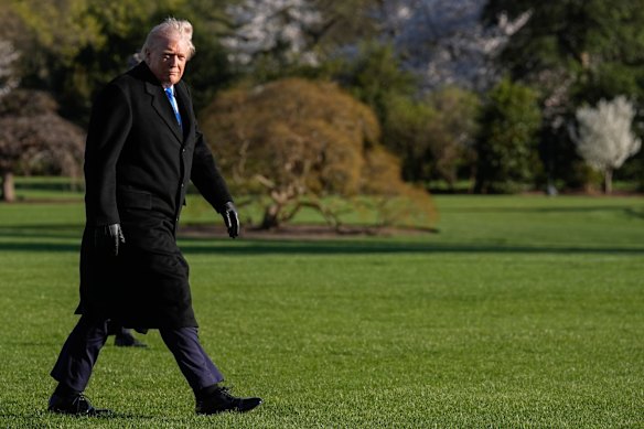 US President Donald Trump walks on the South Lawn of the White House on Tuesday.