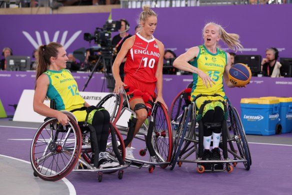 Australia’s Amber Merritt looks for a way past Amy Conroy during the 3x3 wheelchair basketball win over England.