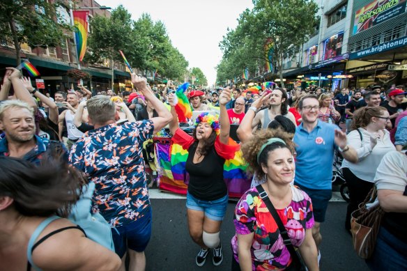 People celebrate the Yes vote on marriage equality in Sydney in 2017.