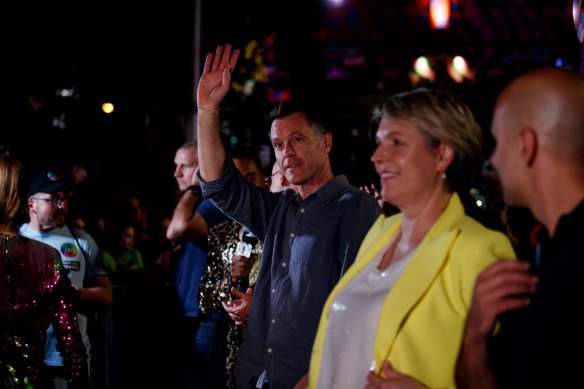 Chris Minns and Labor MP Tanya Plibersek take part in the 45th annual Gay and Lesbian Mardi Gras in 2023. 