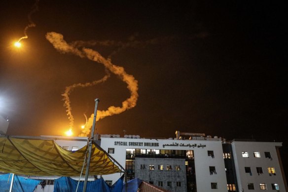 Israeli flares light up the sky above the Al-Shifa hospital in Gaza City.