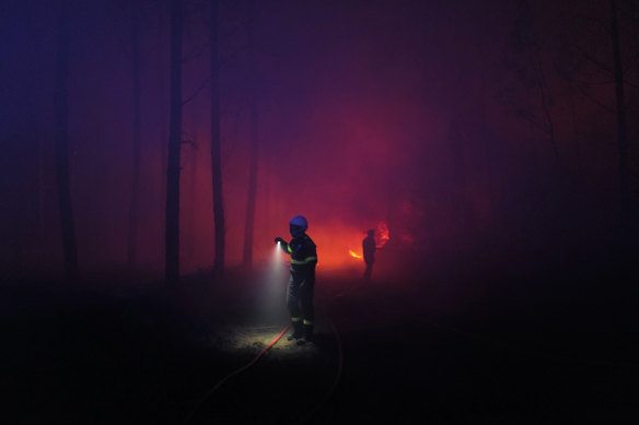 Firefighters at a wildfire  near Landiras, southwestern France. 