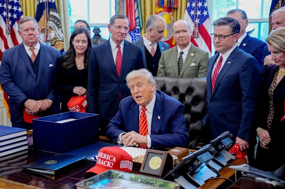 President Donald Trump with Republican members of the House of Representatives and the Senate on Tuesday (Washington time).