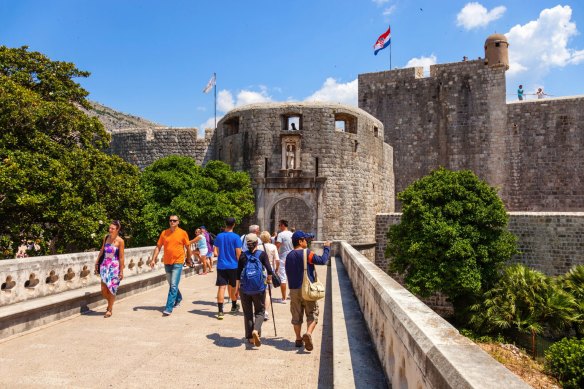 Tourists outside the Pile Gate in Dubrovnik, Croatia.