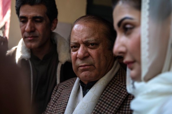 Nawaz Sharif, Pakistan’s former prime minister, center, and his daughter Maryam Nawaz Sharif, right, at a polling station in Lahore on Thursday.
