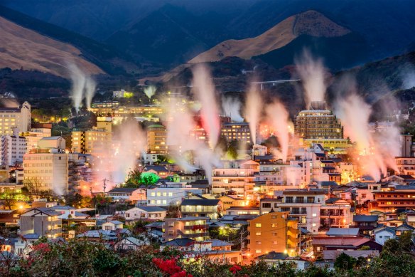 Steam rises from hot spring bath houses in Beppu.