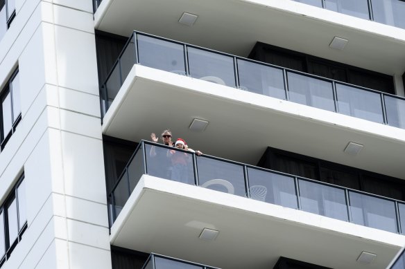 Stuart Rogers, wife Clair and daughter Astrid are stuck in hotel quarantine at the Meriton on Pitt St over Christmas.