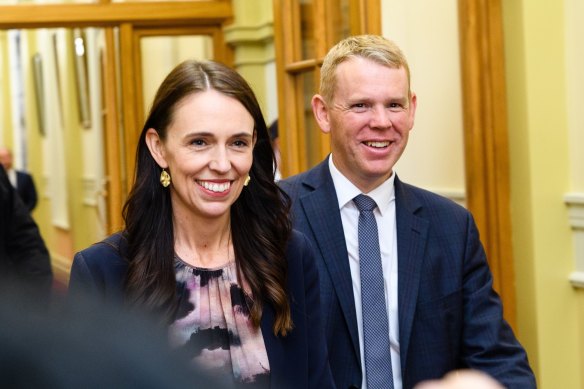 Chris Hipkins (right) became NZ prime minister after Jacinda Ardern resigned. He is serving the rest of the term and seeking to be elected this month.