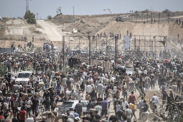 Palestinians at a humanitarian aid centre in the Netzarim Corridor, central Gaza Strip last Thursday.