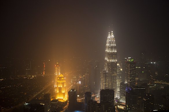 The Petronas Twin Towers in Kuala Lumpur, Malaysia, shrouded in haze from the Indonesian fires this month.