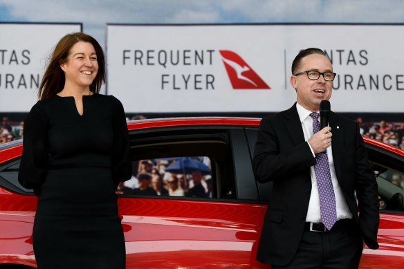 The head of Qantas’ loyalty program Olivia Wirth with former chief  Alan Joyce. 