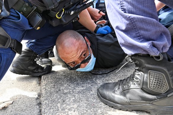 Police made dozens of arrests in Sydney as they suppressed an anti-lockdown protest.