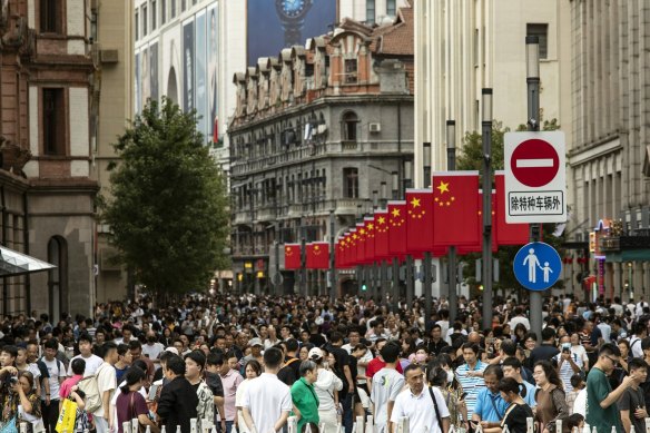 More than 1 million people walk down Nanjing Road in Shanghai every day, but very few of them use cash.