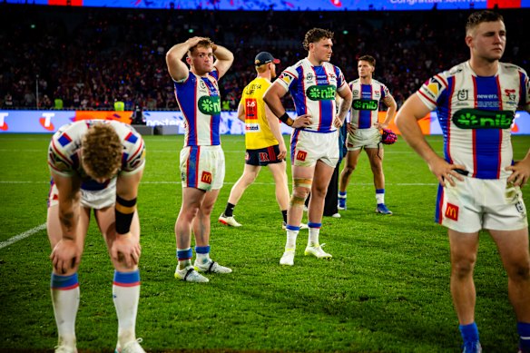 The defeated Newcastle Knights after full-time.