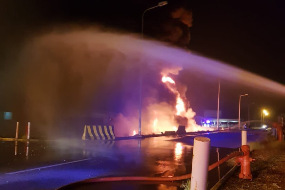 Firefighters try to extinguish a blaze at an Aramco terminal in the southern border town of Jizan, Saudi Arabia. 
