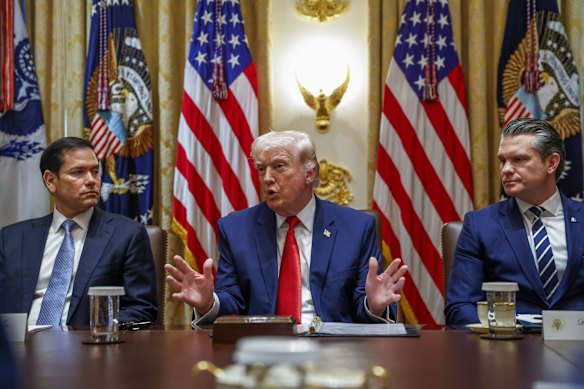 At a cabinet meeting, Trump again criticised Australia for not participating in the war against Iran. He was flanked by Marco Rubio and Pete Hegseth.