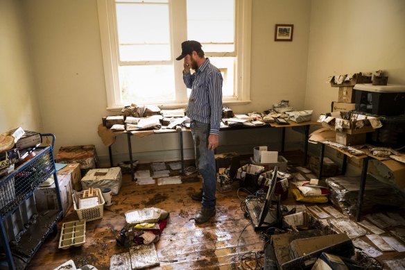 Brendan Mansbridge, committee member of the Eugowra rural transaction centre. It was destroyed during flash flooding.