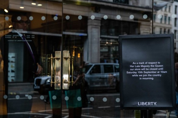 A sign informing customers that the Liberty London department store is closed on the first day of public mourning following the death of Queen Elizabeth II.