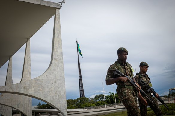 Members of the military outside the Planalto Palace following attacks on government buildings by supporters of former Brazilian president Jair Bolsonaro in Brasilia.