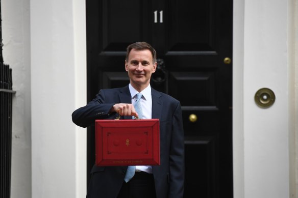 UK chancellor Jeremy Hunt leaves Downing Street to present his budget to parliament last week.