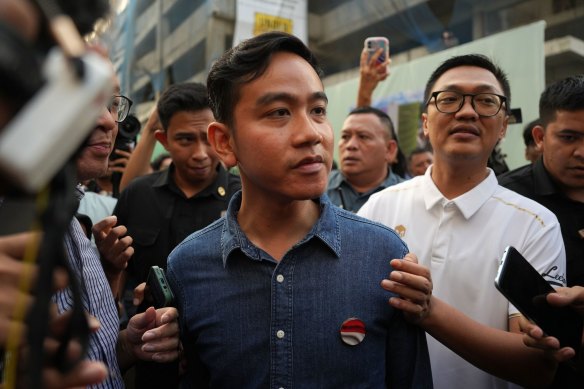 Gebran Rakabuming Rakam, the eldest son of President Joko Widodo and mayor of their hometown of Sulu, is Subianto's running mate.