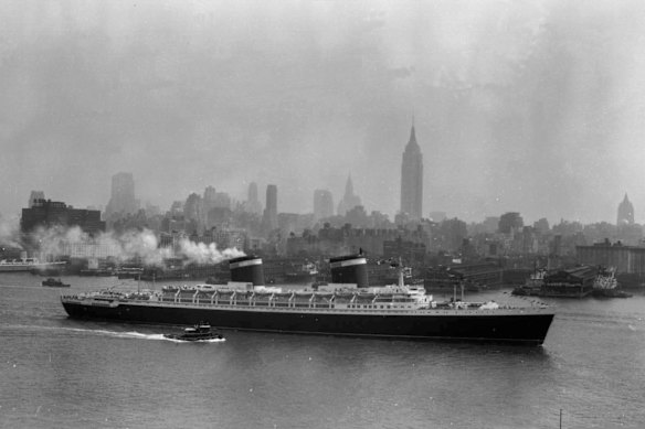 The SS United States travels along New York’s Hudson River as it begins its first voyage to Europe from New York, July 3, 1952.