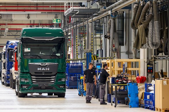 Electric trucks on the production line at the MAN Truck and Bus plant in Germany. 