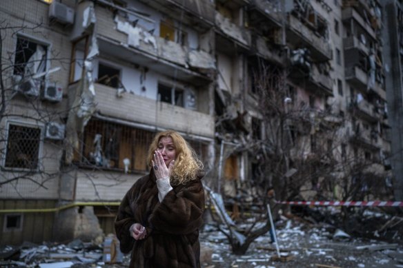 Natali Sevriukova outside her Kyiv apartment block following a rocket attack on Friday. 