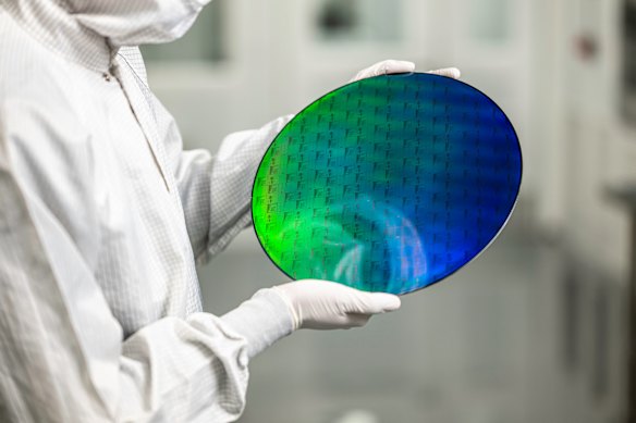 A photonic wafer, which will form part of the quantum computer that PsiQuantum is building in Queensland.