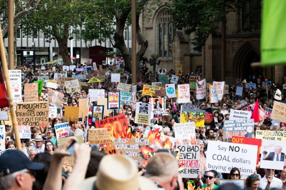 Climate protesters rally in Sydney amid the bushfire crisis.