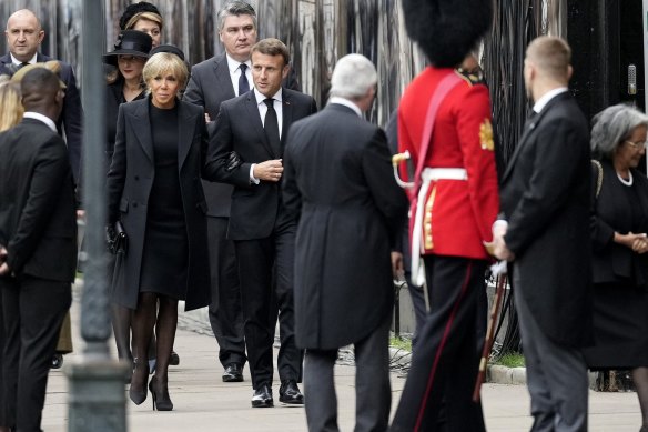 Emmanuel and Brigitte Macron arrive at Westminster Abbey.