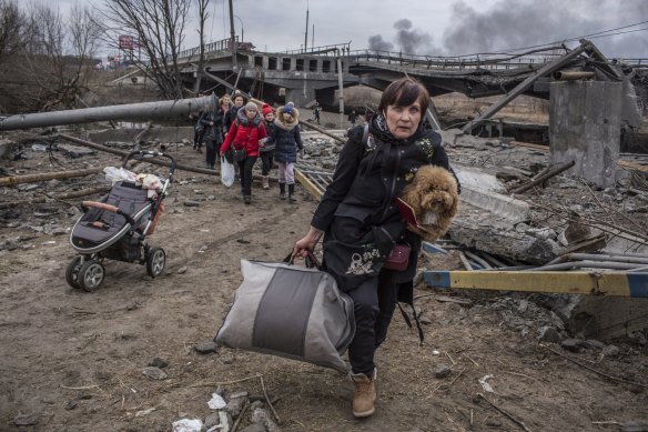People fleeing the town of Irpin, Ukraine, on Sunday.