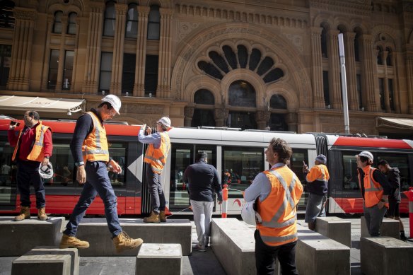 The tram passes the Queen Victoria Building on George Street on Wednesday.