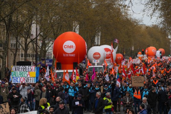 People demonstrate against President Emmanuel Macron’s pension reform in central Paris, France, on Thursday.