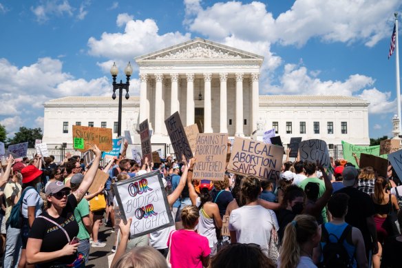 Abortion rights demonstrators chant outside the US Supreme Court in Washington DC on Saturday June 25, 2022.