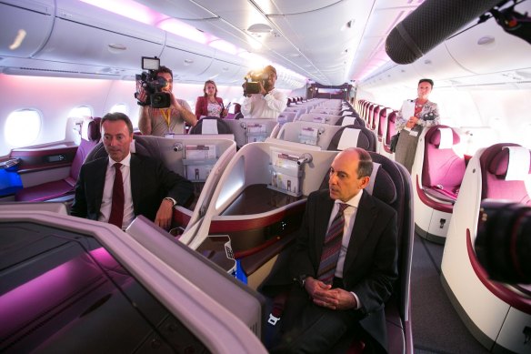 Akbar Al Baker (right), CEO of Qatar Airways, sits in the business class cabin inside the airline’s first Airbus A380.