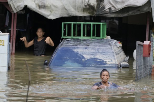 Residents are trapped at their house affected by a flood in Shah Alam, on the outskirts of Kuala Lumpur in 2021.