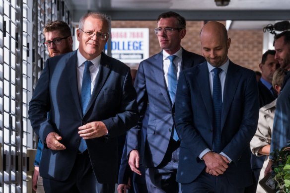 Liberal candidate for Bennelong, Simon Kennedy (right), campaigning with Prime Minister Scott Morrison and NSW Premier Dominic Perrottet. 