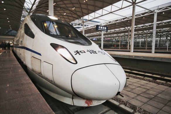 A bullet train is pictured on the Shijiazhuang-Jinan high-speed railway at the Shijiazhuang Railway Station in Shijiazhuang city.